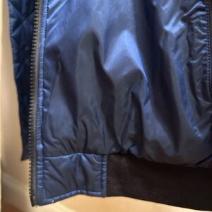 The North face Blue Metallic bomber Jacket